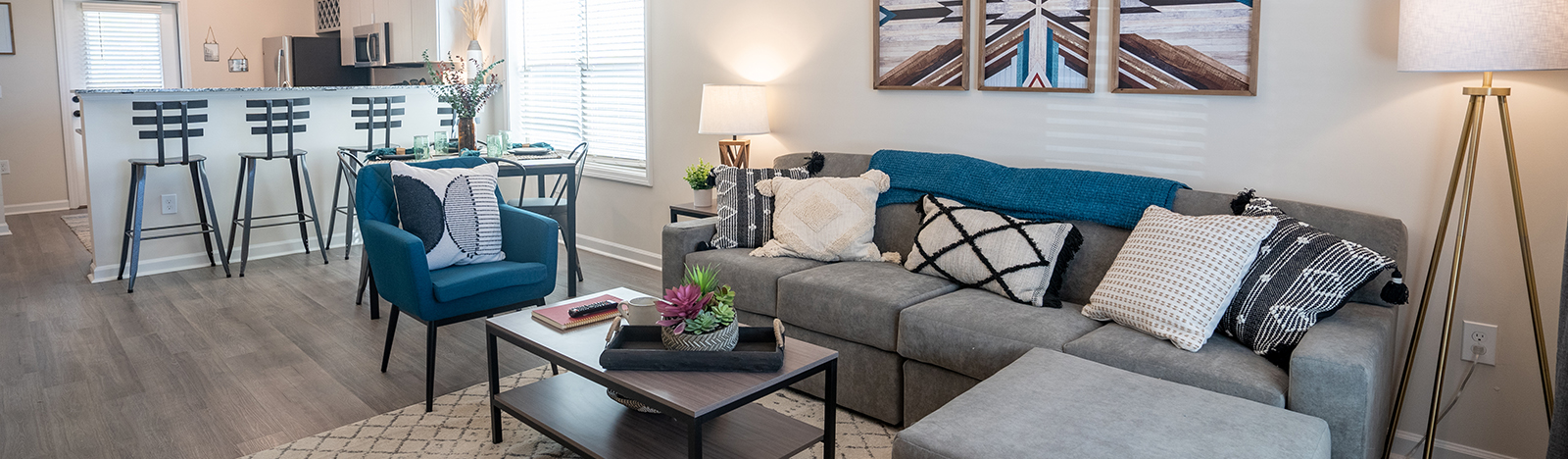 Furnished apartment featuring an open floor plan