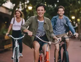 three people riding bicycles