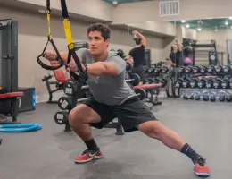 a man exercising in a fitness center